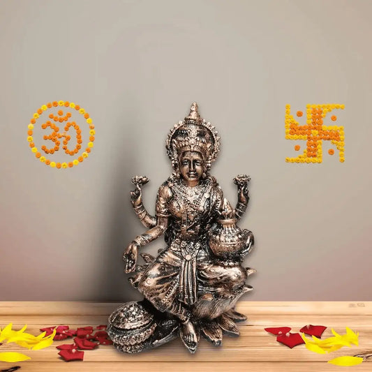 7-inch Lakshmi Ji idol in copper matte finish made of resin, placed on wooden decor setup